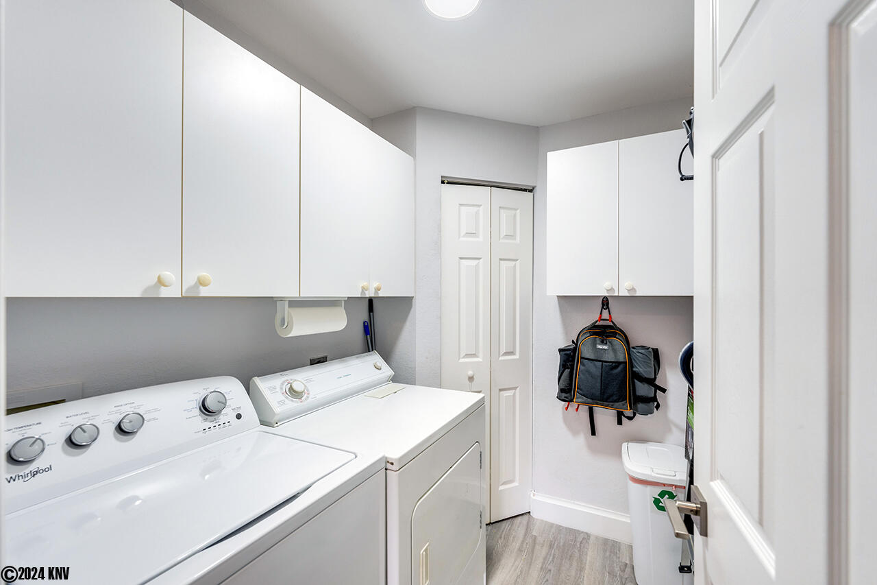 Full sized Laundry Room with Washer and Dryer