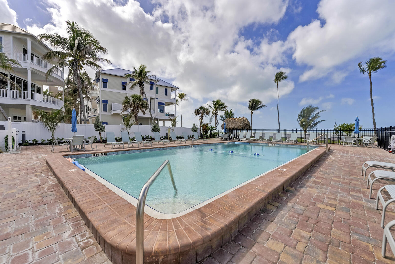 Fabulous Resort Sized Heated Pool and Sundeck sits beachside