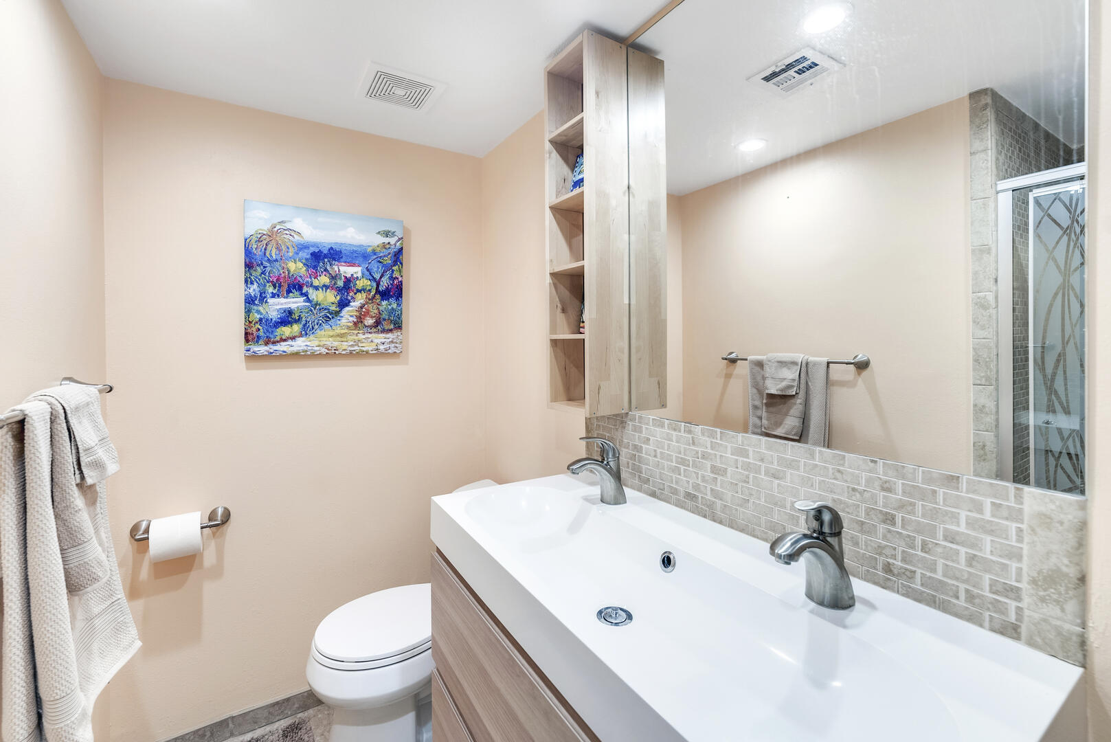 Double Vanities and Walk In Shower in the Guest Bath