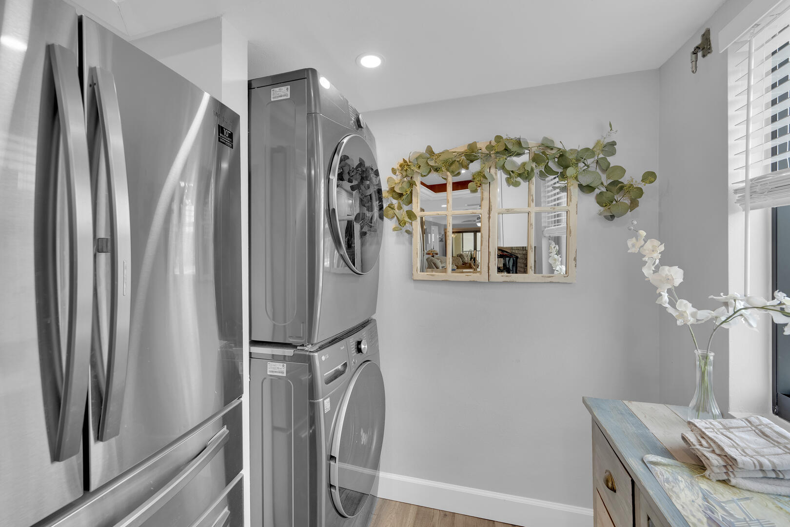 Washer and dryer located in the unit