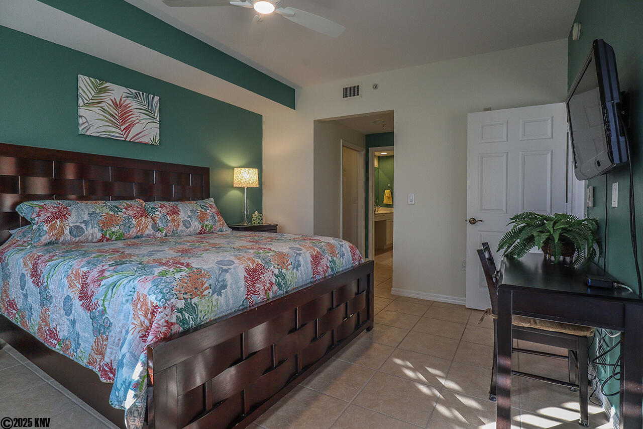 Master Bedroom En Suite has a desk and a TV