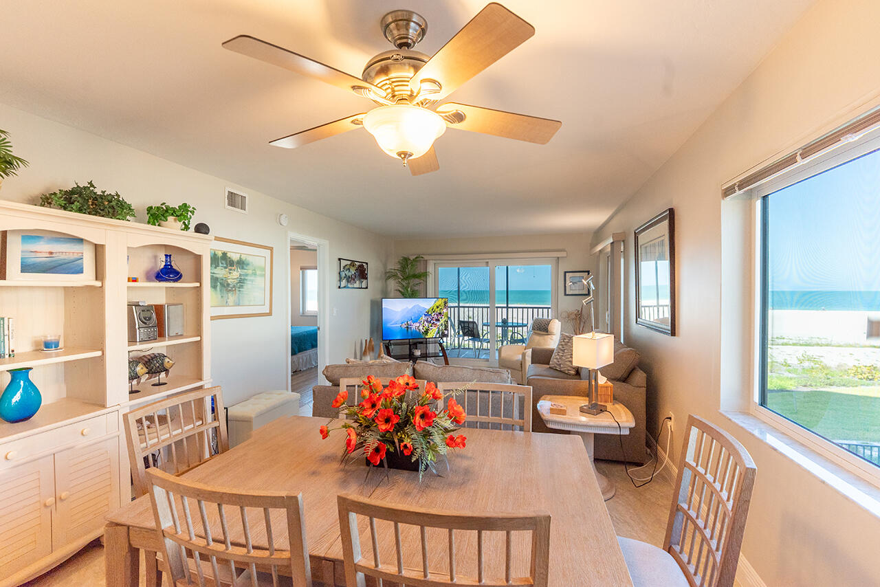 Unwind in this bright, airy living space featuring comfortable furnishings that create the perfect coastal retreat.