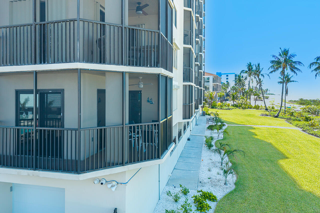 This Beachfront Condo has a private Screened In Lanai