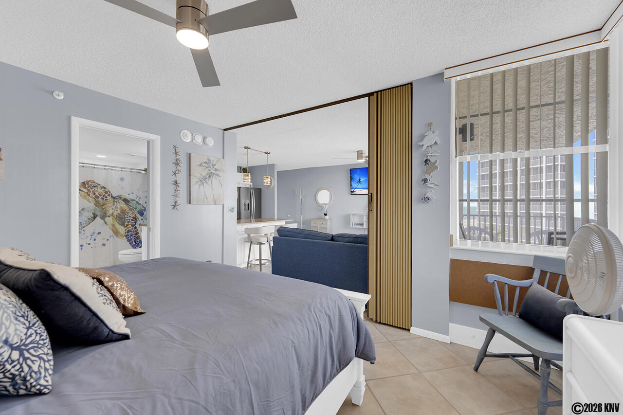 Bedroom has a folding partition for privacy