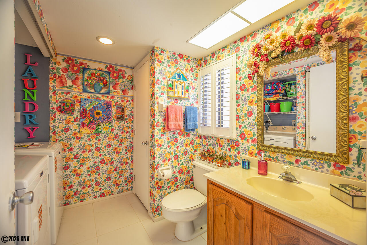 Half Bath and Laundry Room just off the Entrance