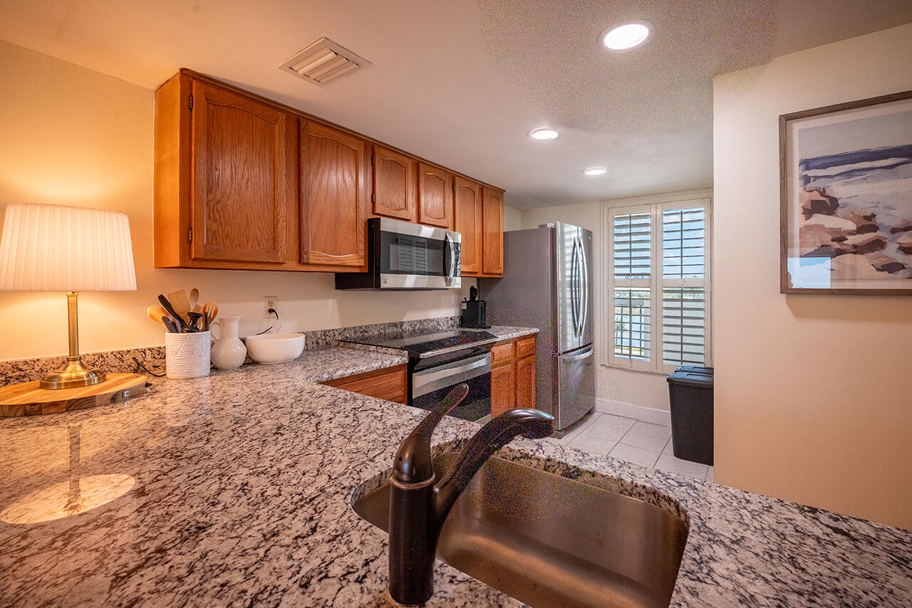 Fully Equipped Kitchen has all the appliances, dishware, cookware and tableware to entertain