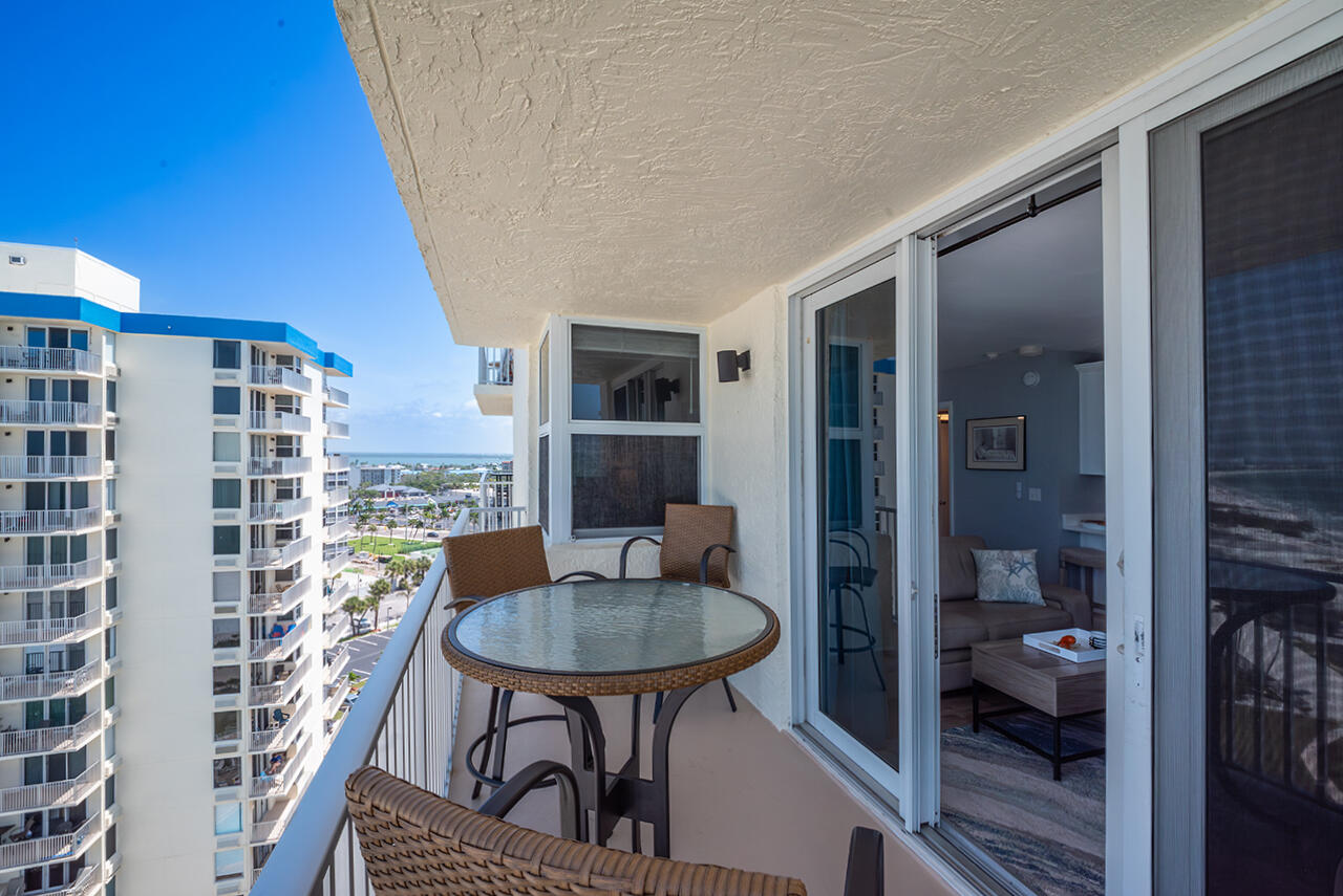 Balcony offers a place to sit and relax and take in the sea breezes. Panoramic view from the Gulf to the Bay.