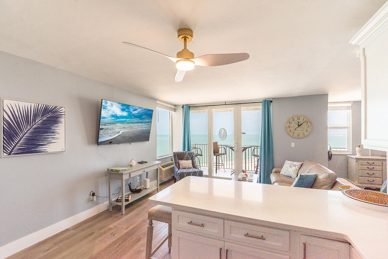 Life is Better at the Beach! You enjoy a beautiful view of the beach from every corner of this island condo