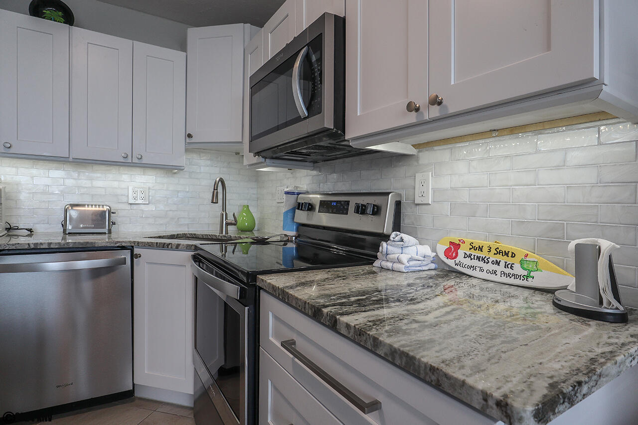 Granite countertops and brand new custom cabinetry 