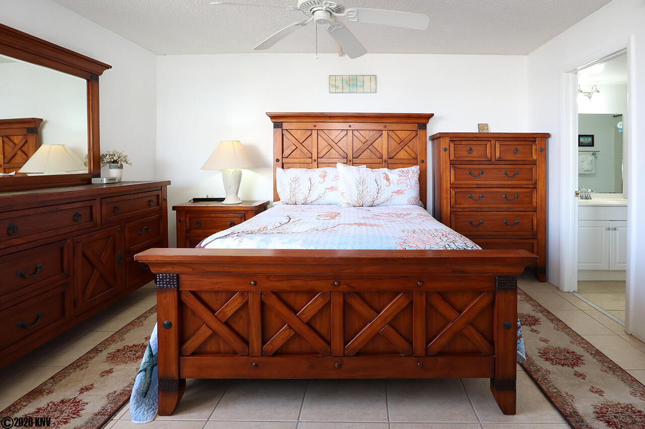 A Queen Sized Bed welcomes you after a day at the beach