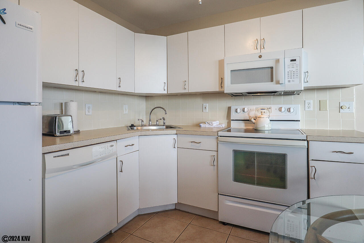 Kitchen includes all dishware, cookware, tableware and appliances