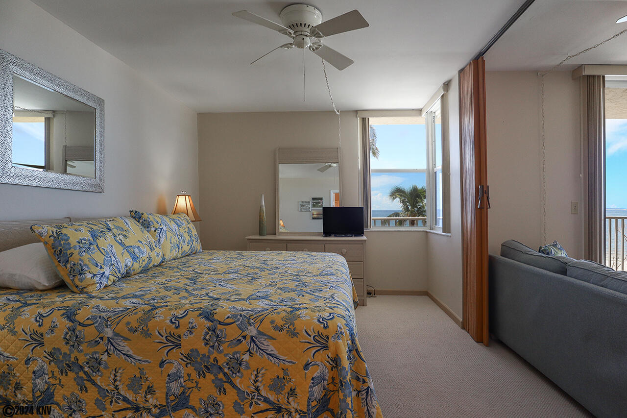 Bedroom has a room divider for privacy if you have guests sleeping on the sleeper sofa