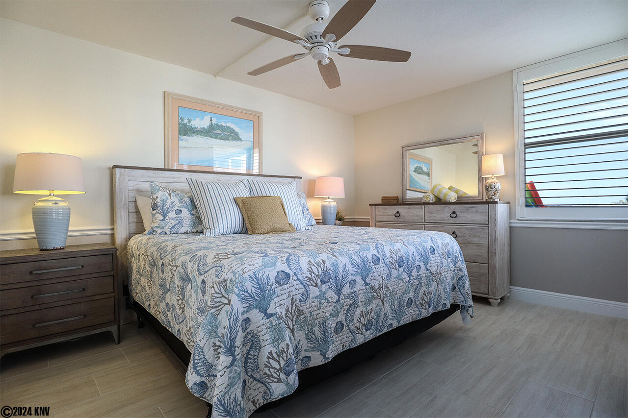 King Sized Bed, Ceiling Fan, plenty of bedroom furniture