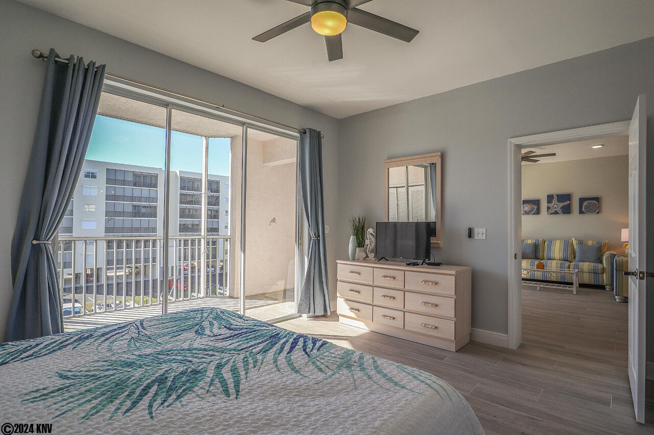 Master Bedroom En Suite features its own TV and private Lanai access