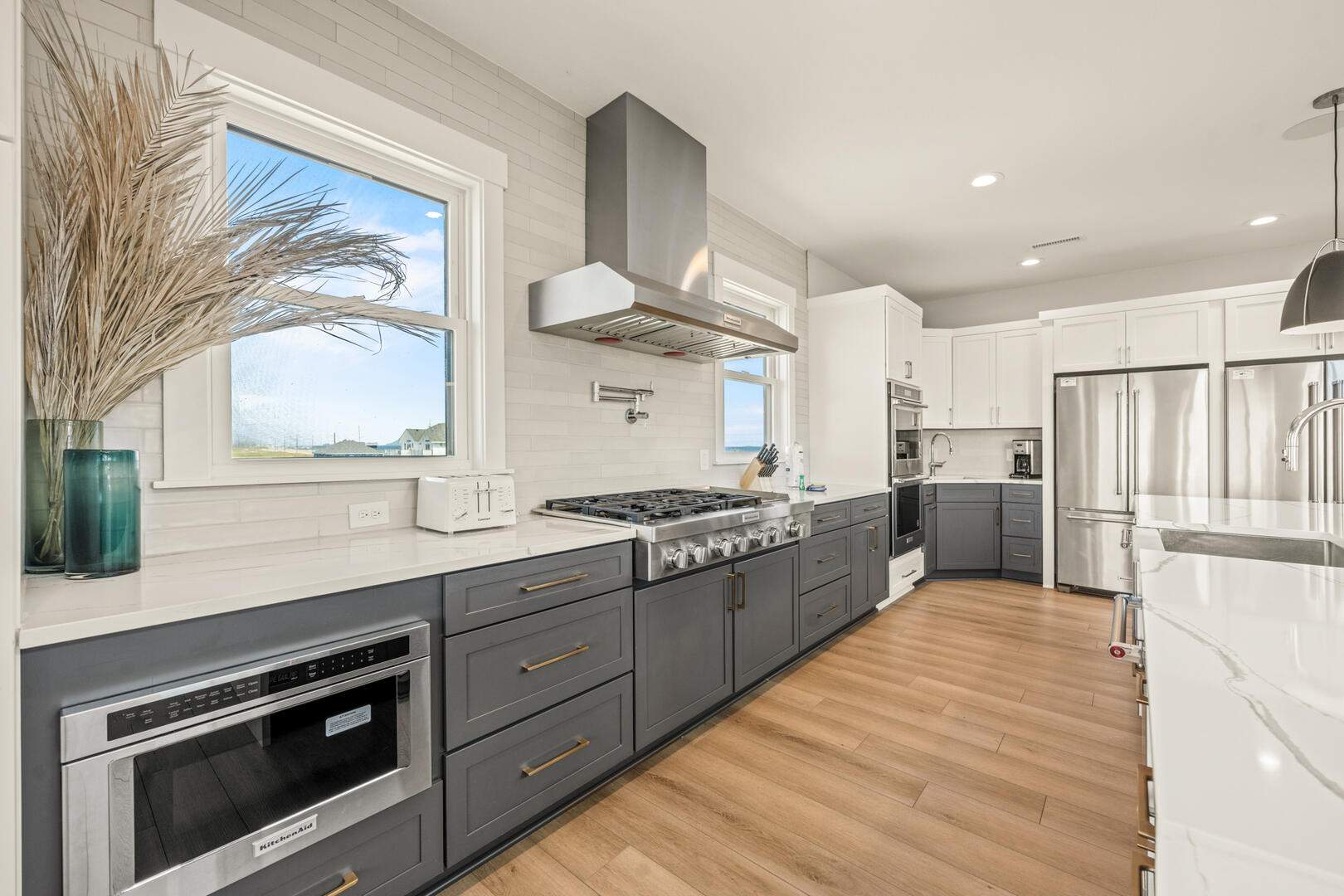 Gourmet Kitchen with Bar Seating and Sound Views on Fourth Level