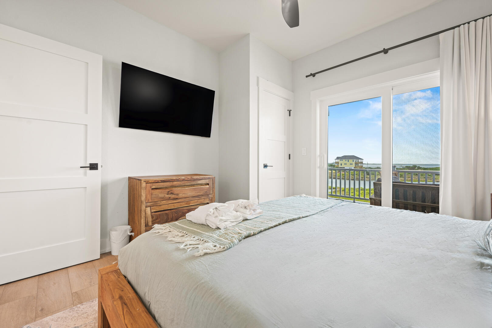 King En Suite with Balcony Access and Sound Views on Third Level