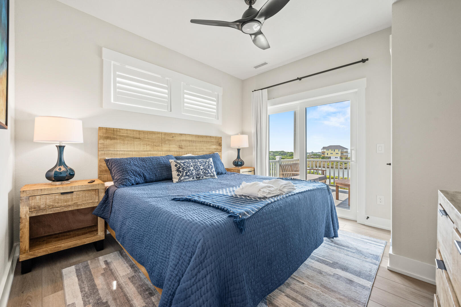 King En Suite with Balcony Access and Sound Views on Third Level