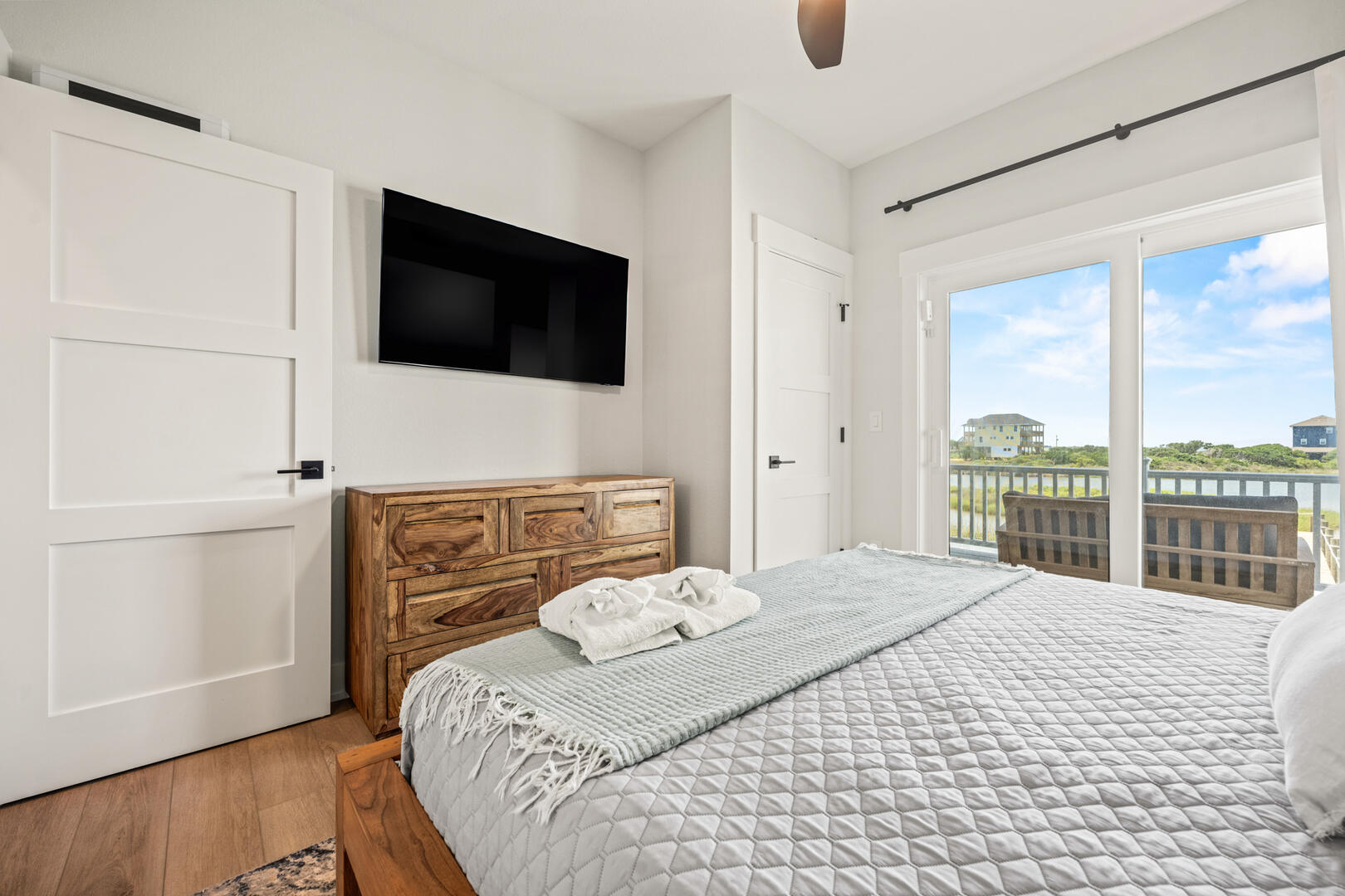 King En Suite with Balcony Access and Sound Views on Second Level