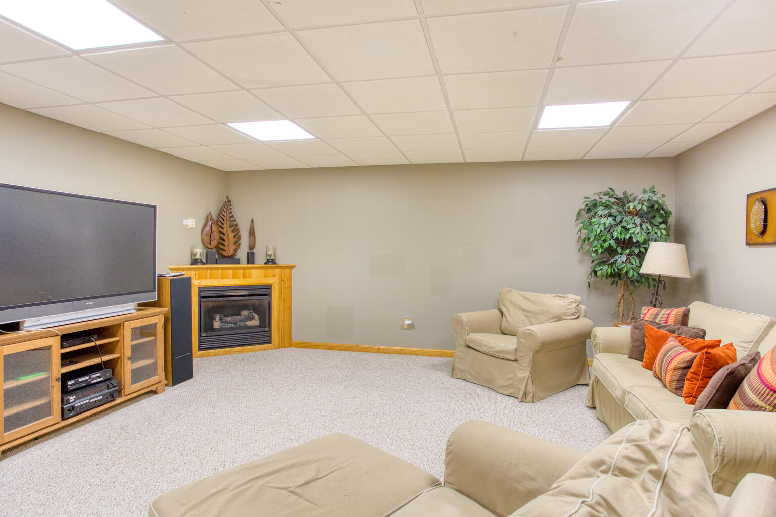 Rec Room seating. Fireplace. TV