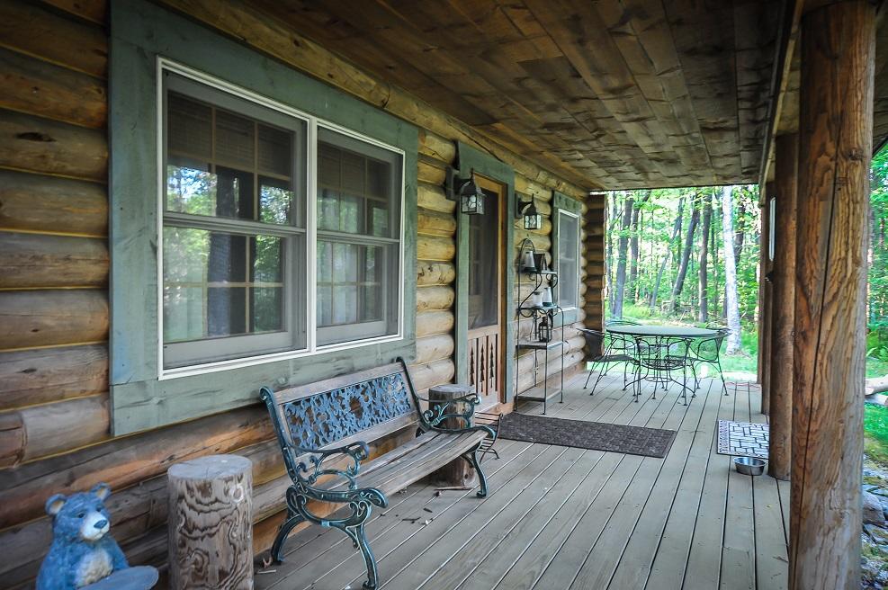 covered porch with seating