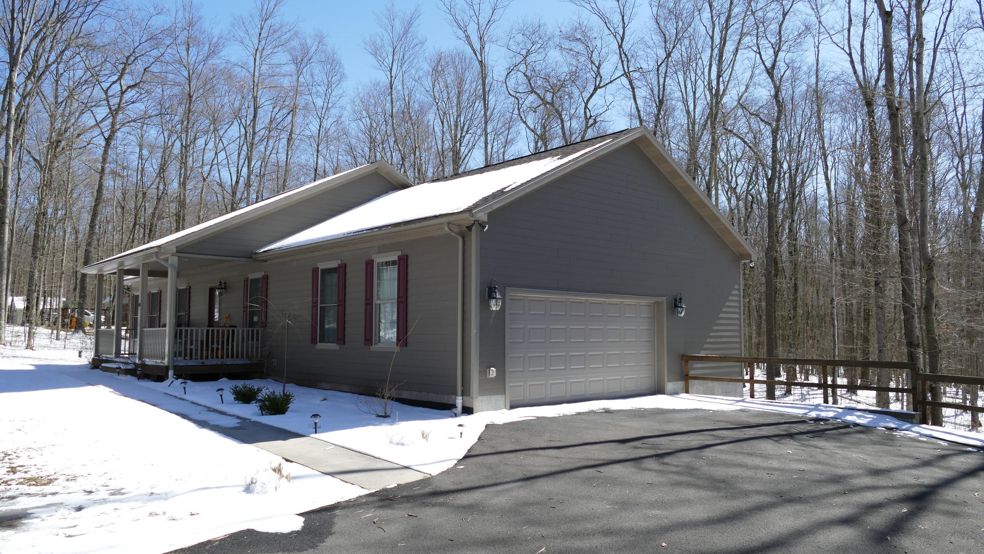 front of house. parking area. winter