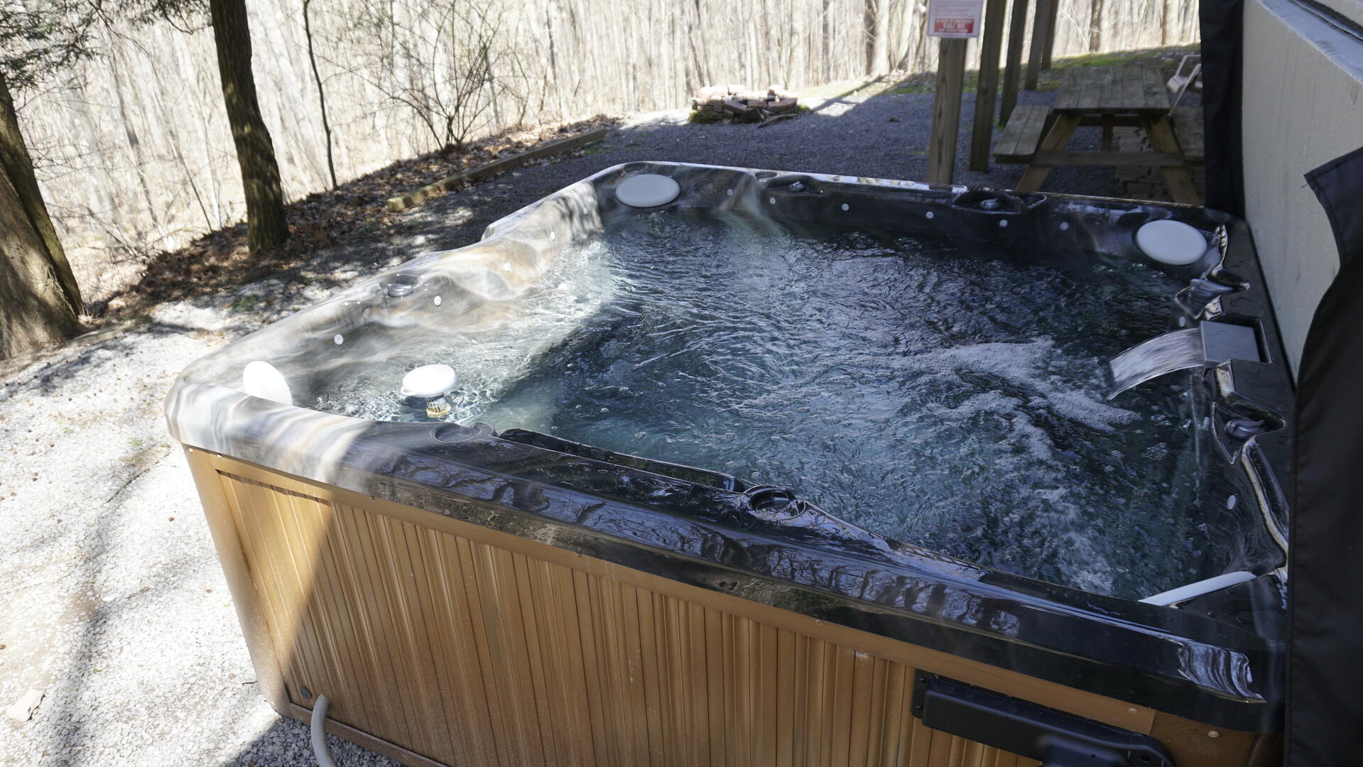 hot tub towards firepit. Early Spring