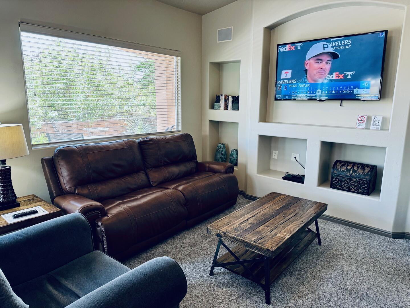 Living Room with TV and access to the Golf Channel