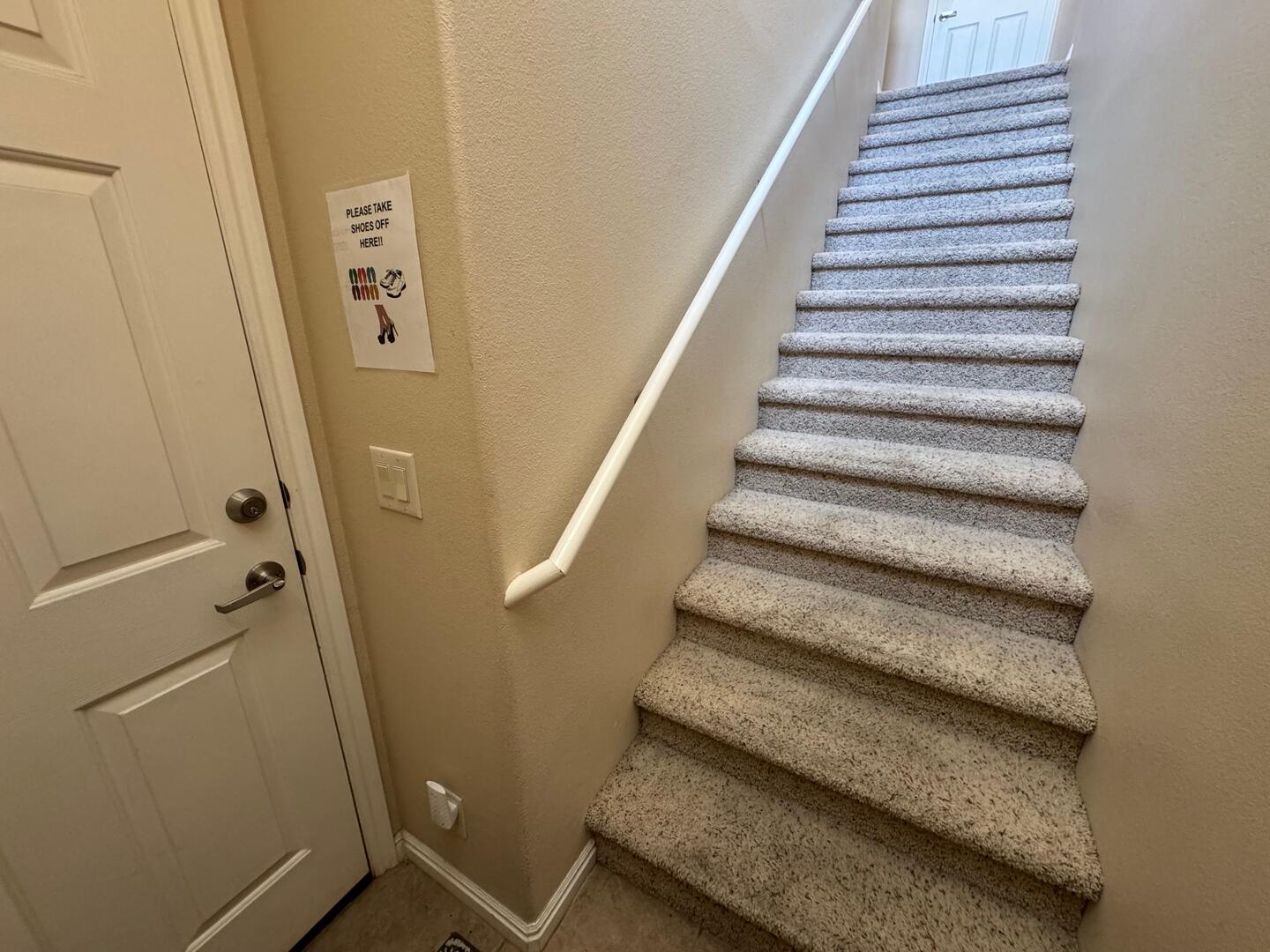 Stairs to Living Area (Garage Locked for Owner Use)