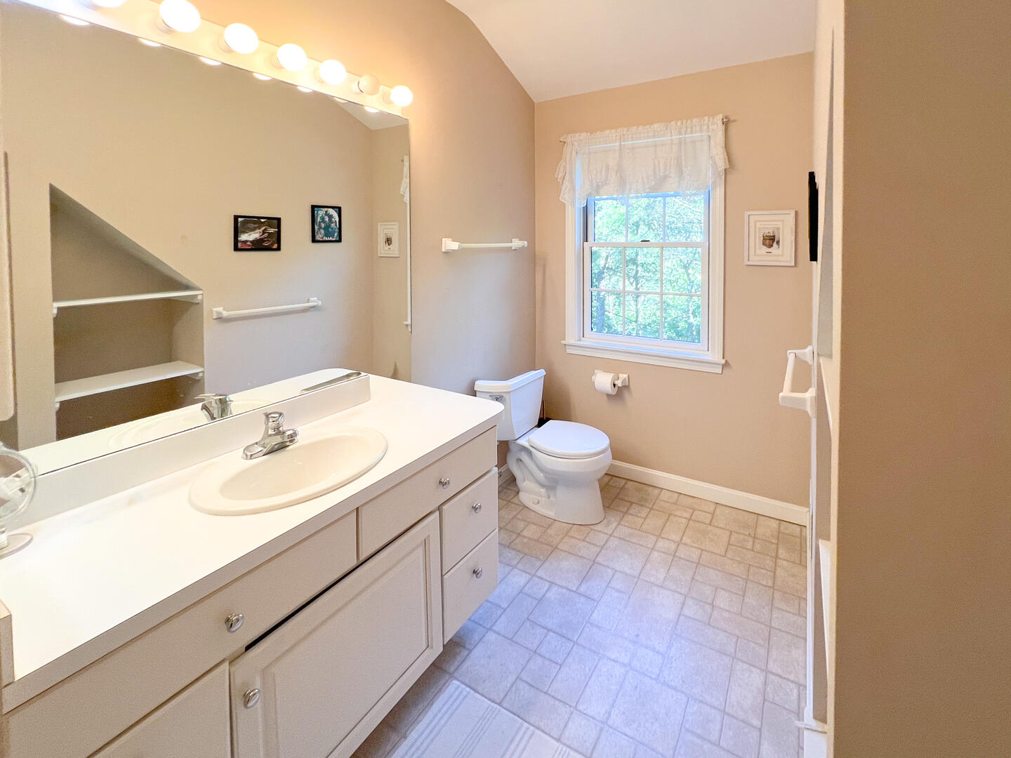 Hall Bath with a Shower Tub Combo, Second Floor