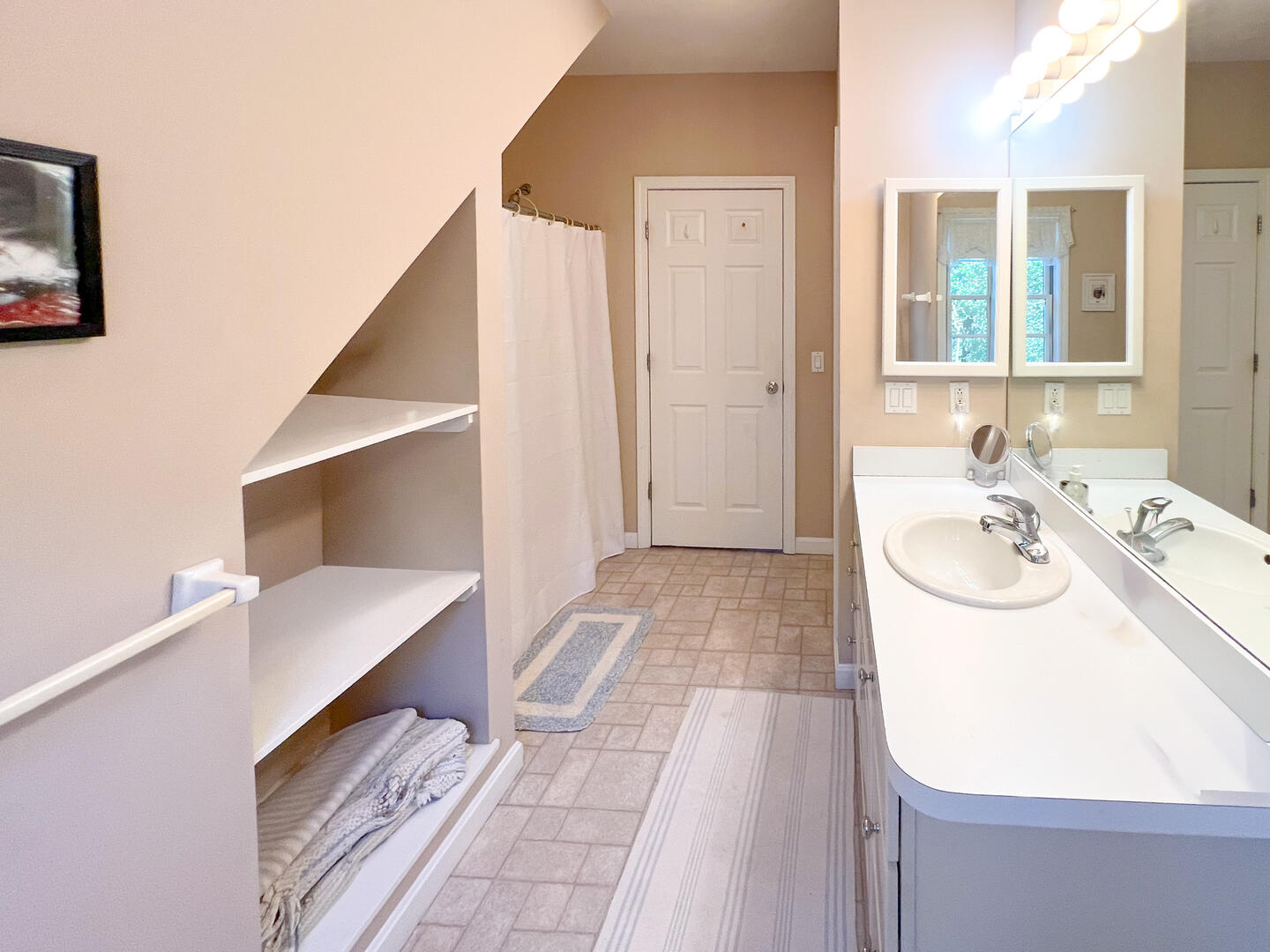 Hall Bath with a Shower Tub Combo, Second Floor