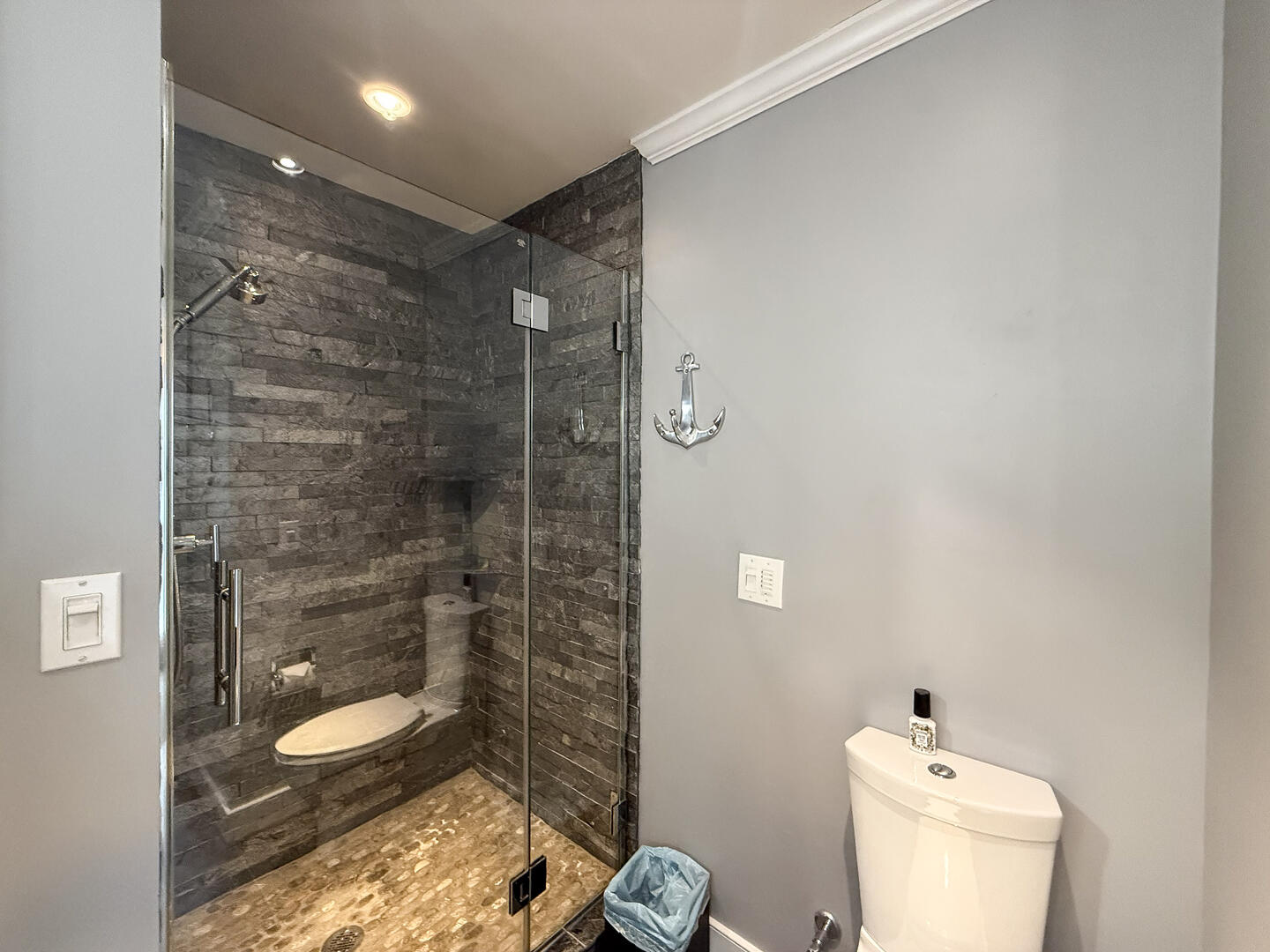 Hall Bath/Laundry with a Shower Stall, First Floor