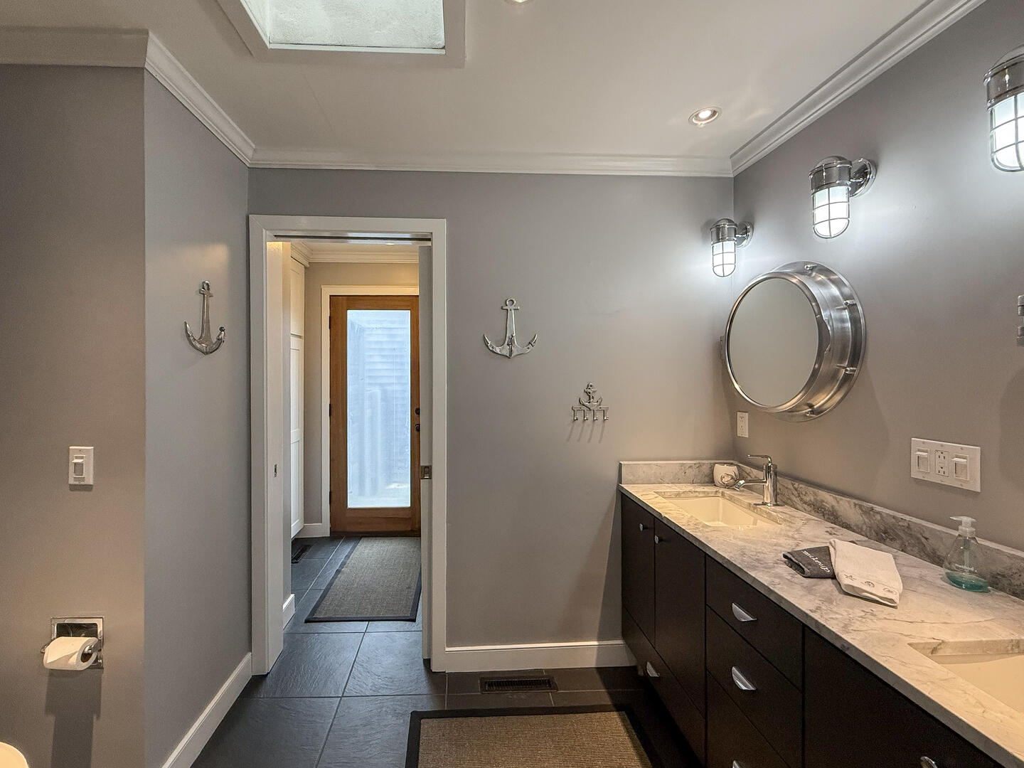 Hall Bath/Laundry with a Shower Stall, First Floor
