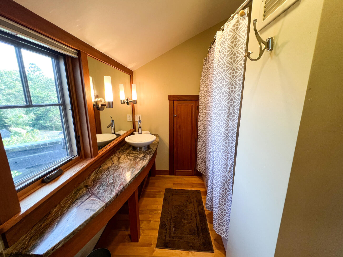 Hall Bath with a Shower Tub Combo, Second Floor