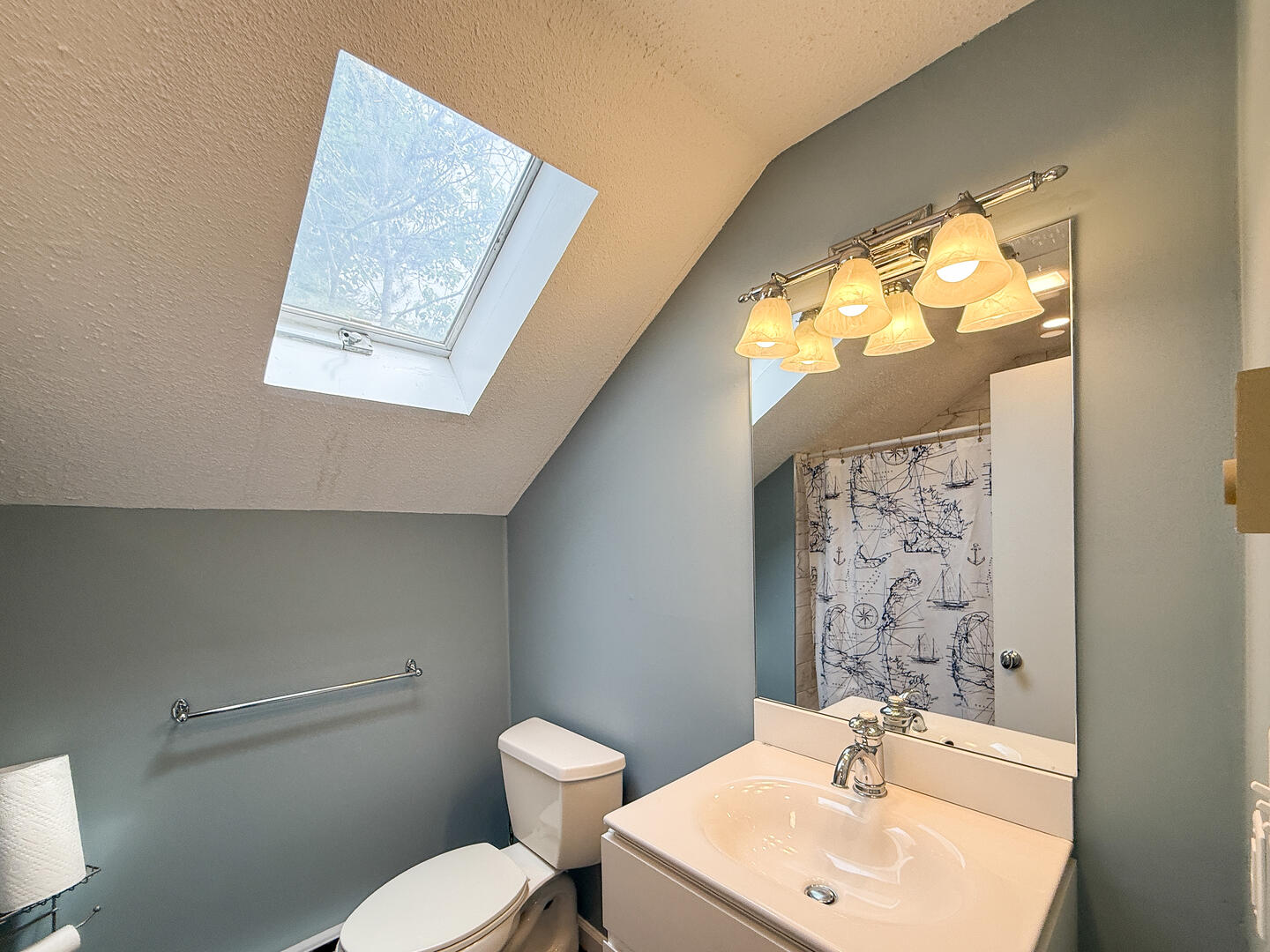 Hall Bath with a Shower Tub Combo, Second Floor