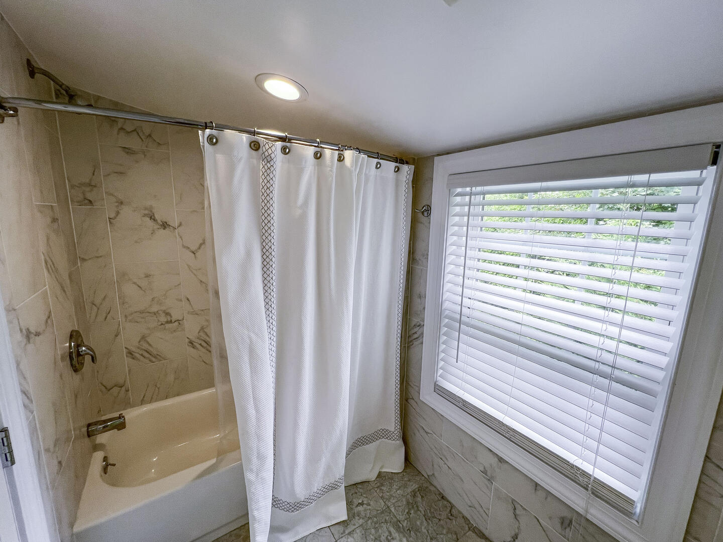 Hall Bath with Tub Shower Combo, Second Floor