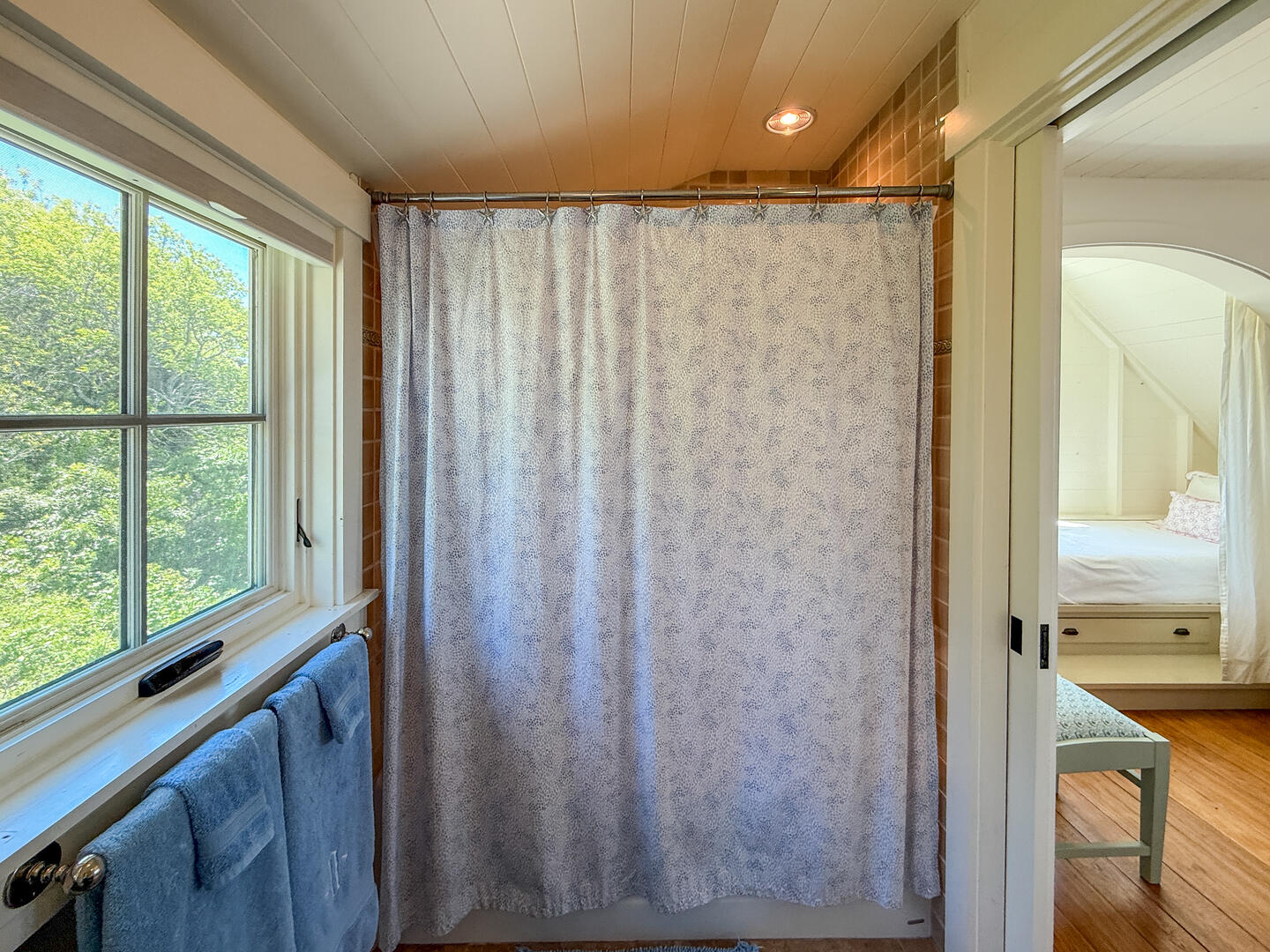 Hall Bath with a Shower Tub Combo, Second Floor