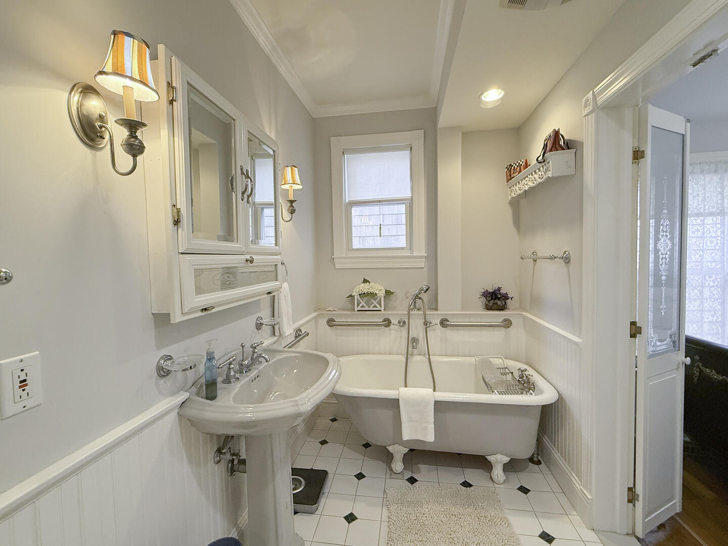 BR1 Adjoining/Hall Bath with a Claw Foot Tub and Hand Held Shower, First Floor