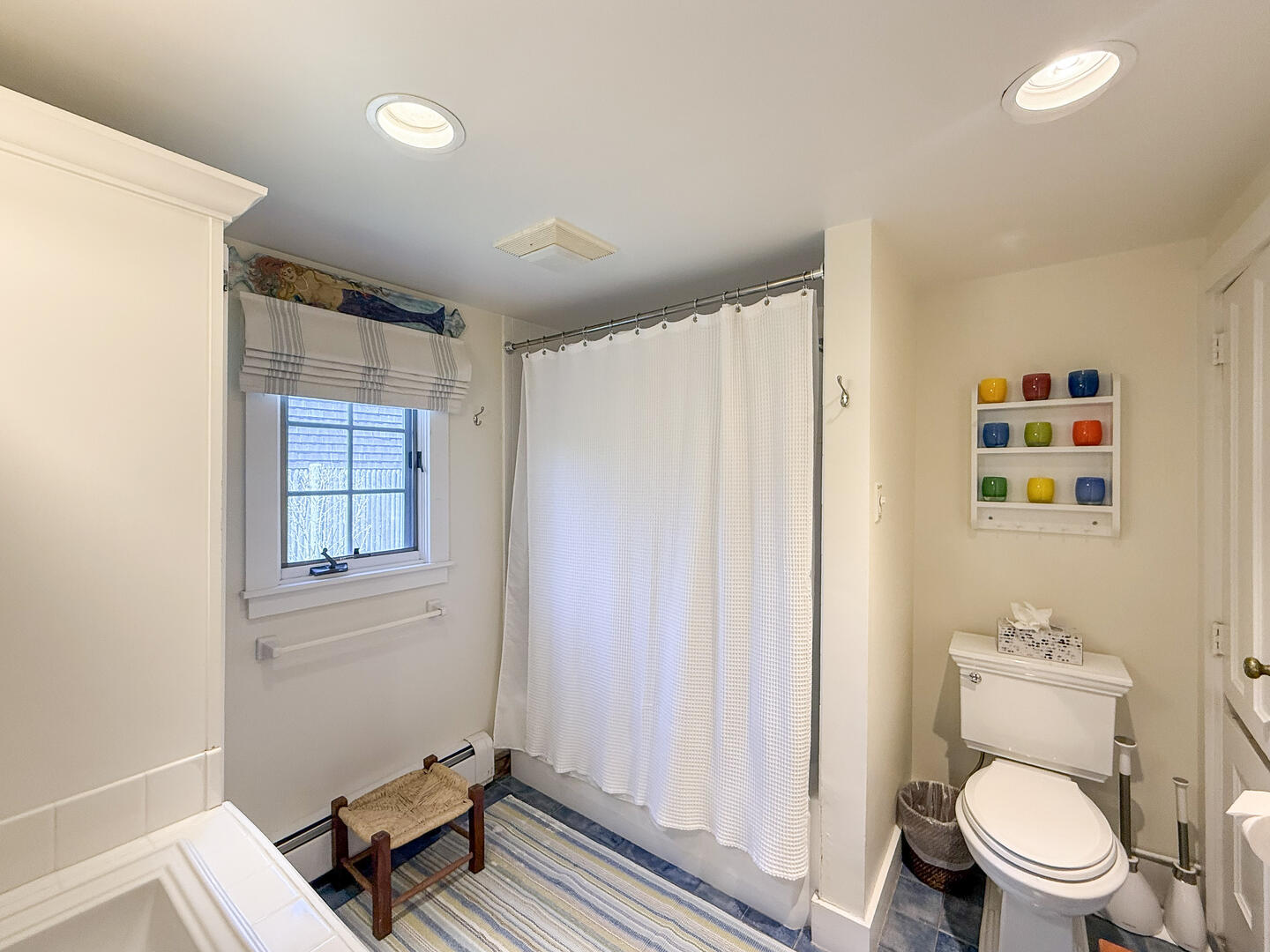 Hall Bath with a Shower Tub Combo, First Floor