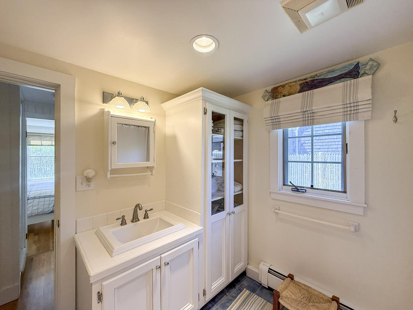 Hall Bath with a Shower Tub Combo, First Floor