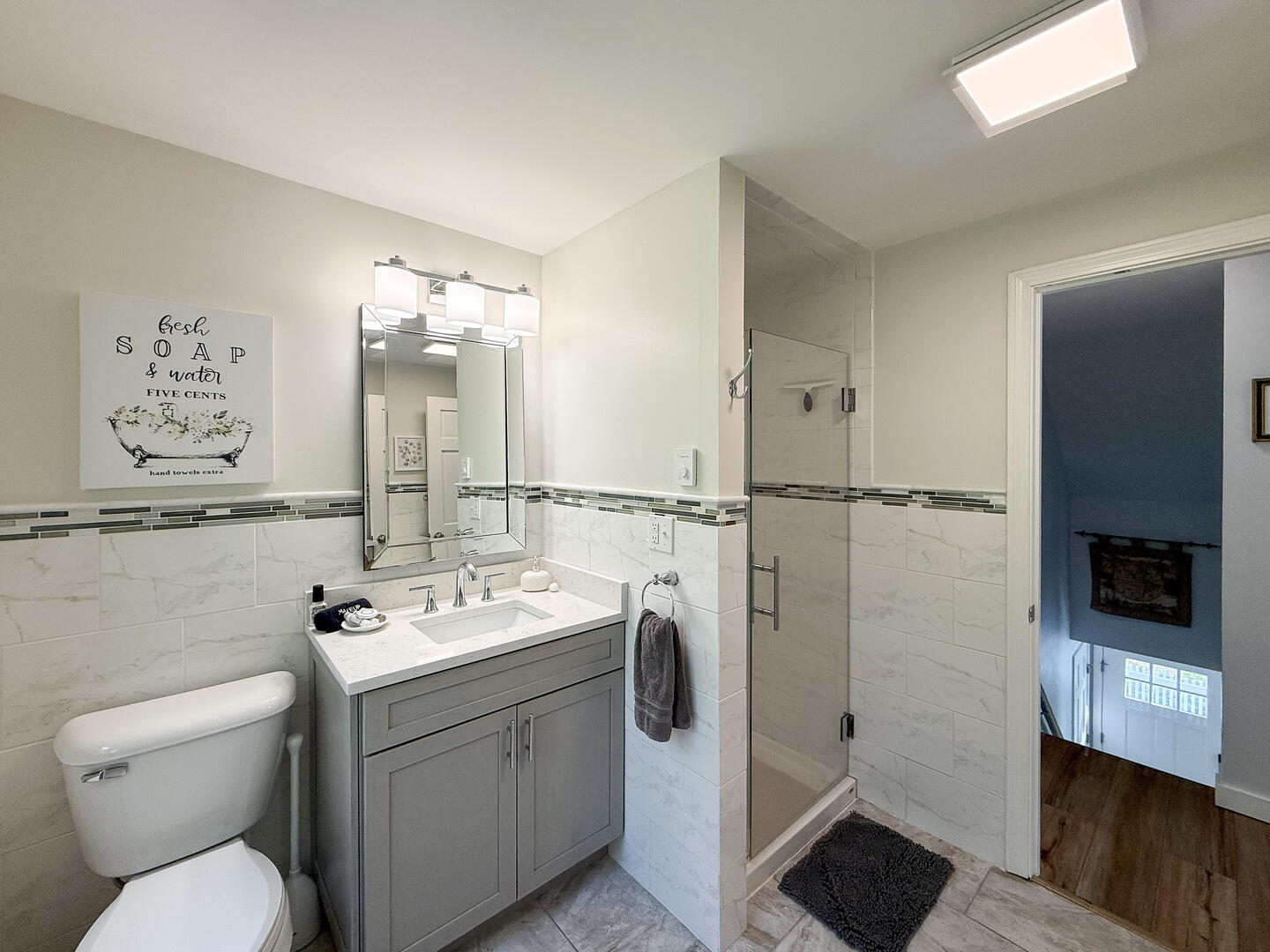 Adjoining Hall Bath with a Shower Stall, Second Floor