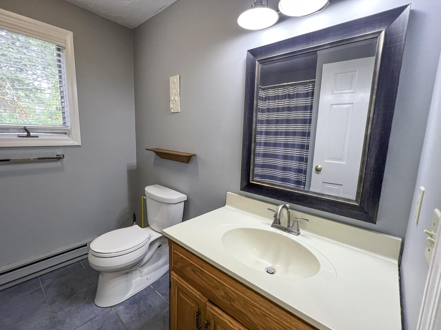 Hall Bath with Tub Shower Combo, First Floor