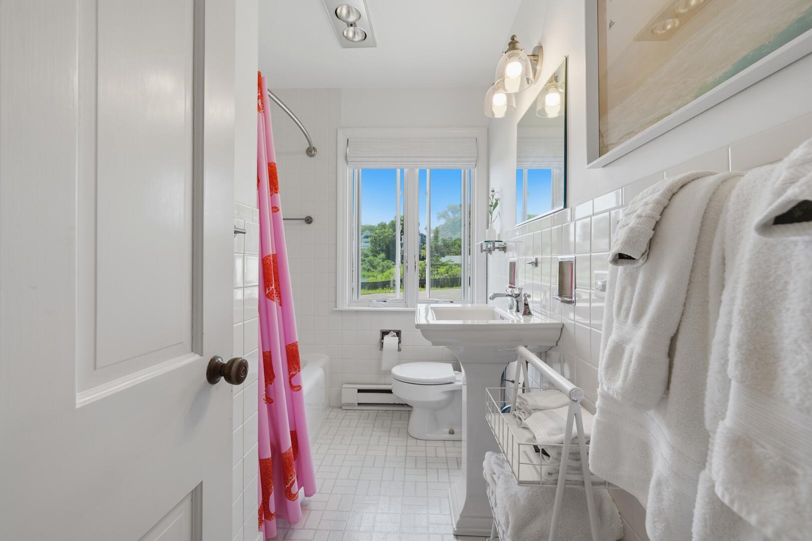 Hall Bath with a Shower Tub Combo, Main Level