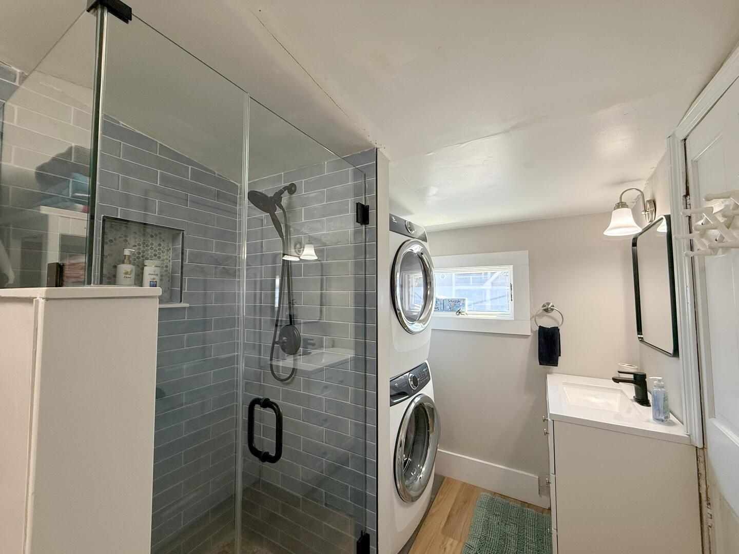 Adjoining Bath with a Shower Stall 