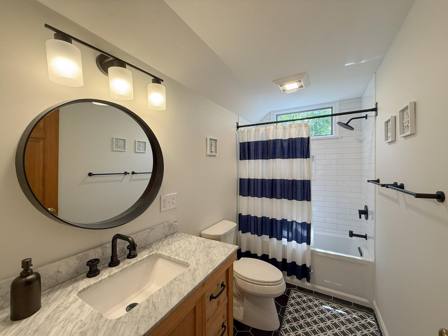 Hall Bath with a Shower Tub Combo, Second Floor