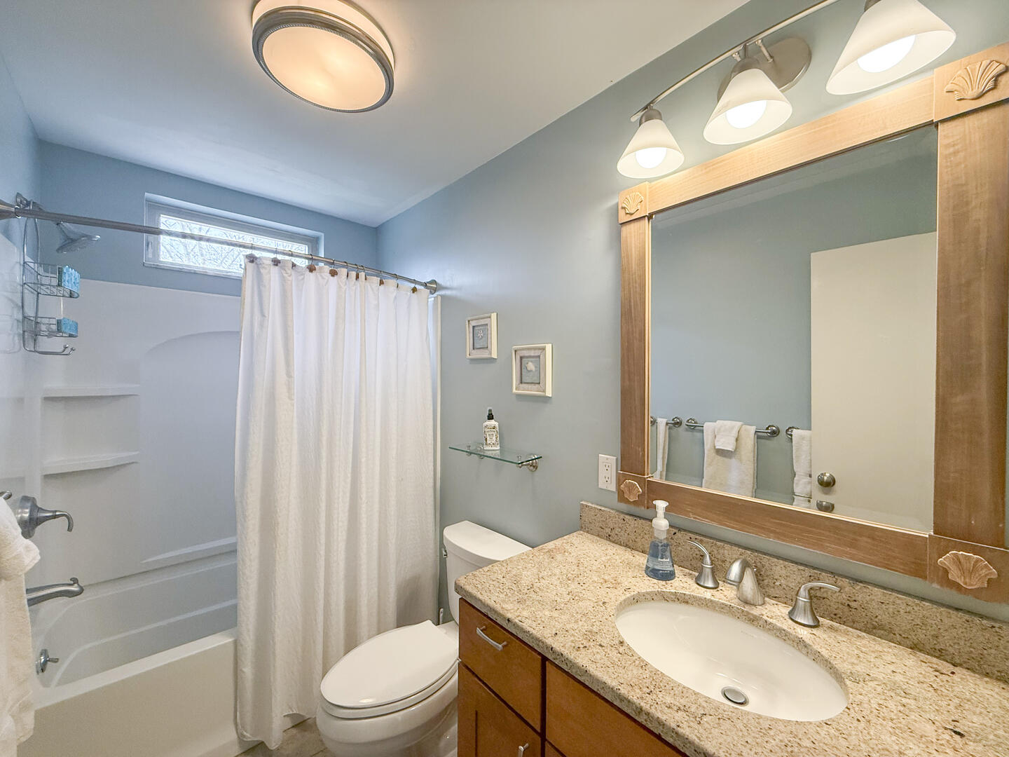 Hall Bath with a Shower Tub Combo, Second Floor