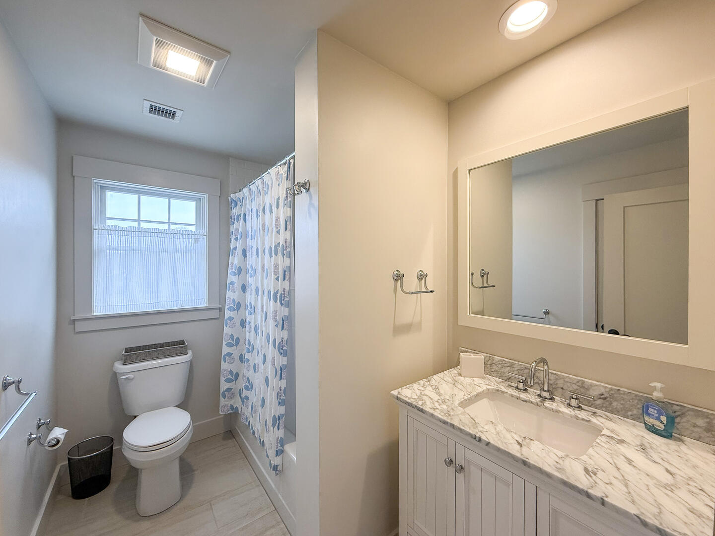 Hall Bath with a Shower Tub Combo, Second Floor