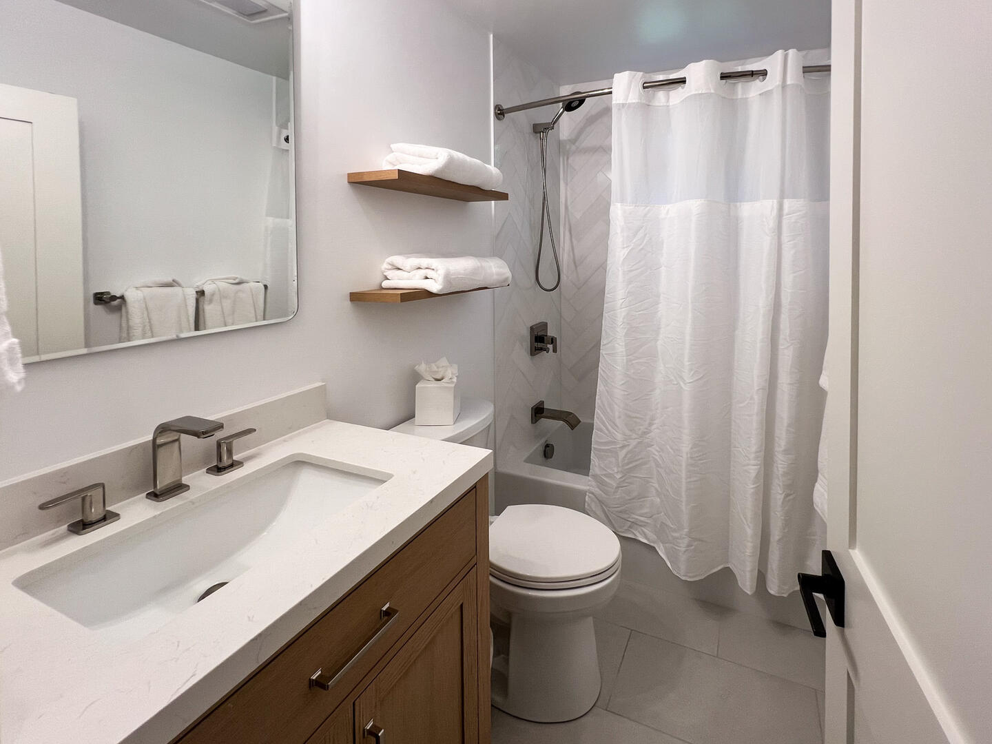 Hall Bath with a Shower Tub Combo, Main Level
