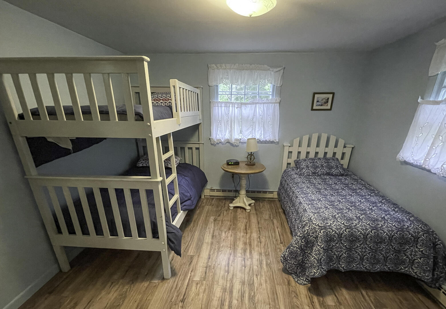 First-floor bunk room with additional twin bed