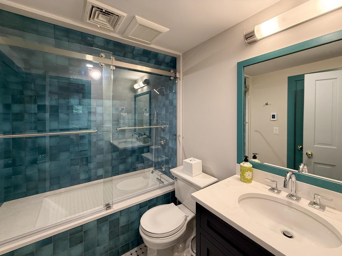 Hall Bath with a Shower Tub Combo, Above Garage Apartment