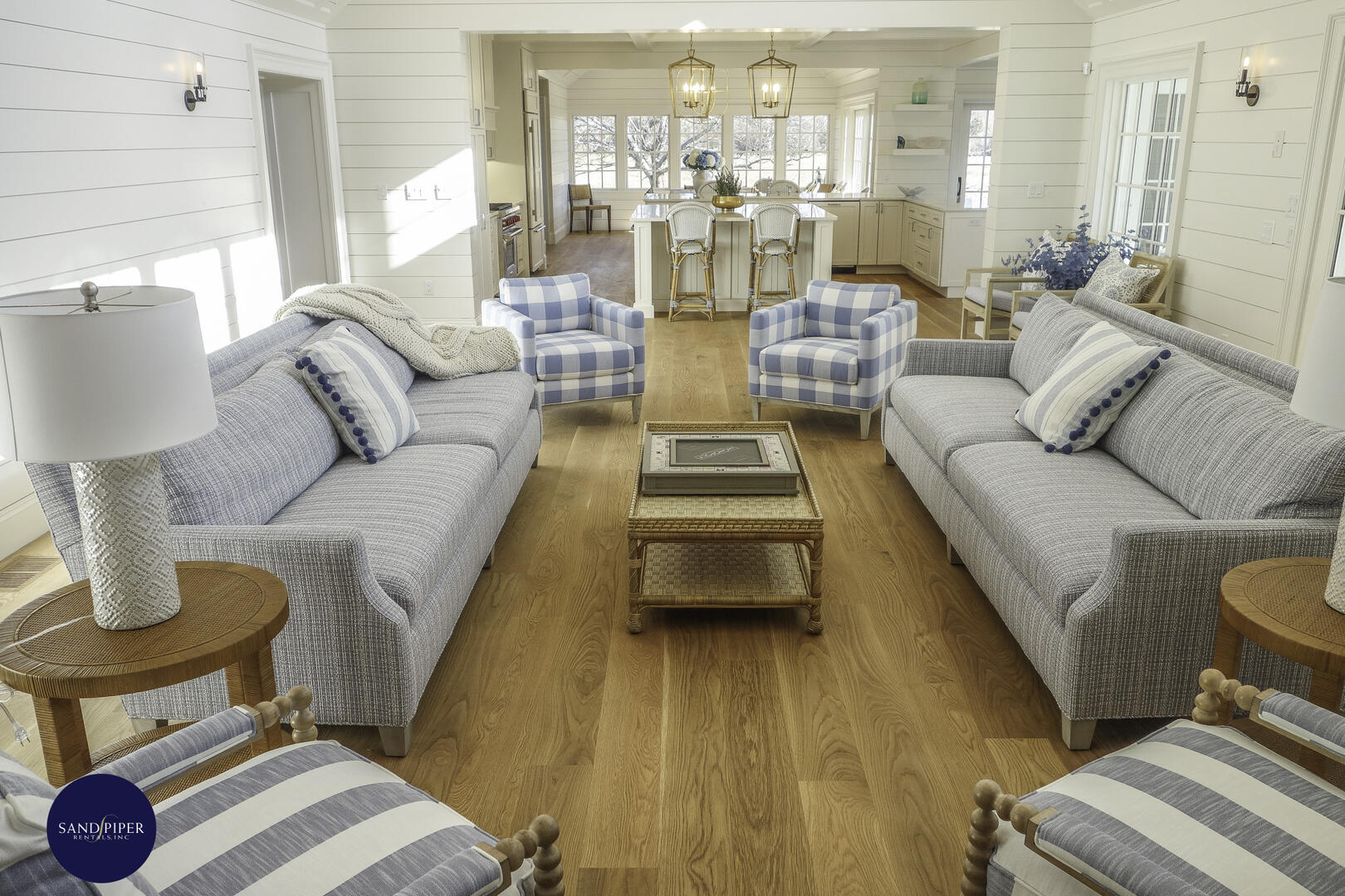 Living Room with Fieldstone Fireplace and Vaulted Ceilings, French Doors to Patio Pool Area